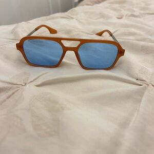 Stylish Orange Sunglasses with Blue Lenses